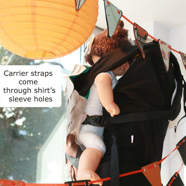 Thread the carrier straps through the t-shirt sleeves